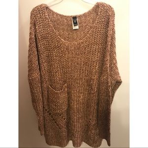 Long knitted sweater with pocket